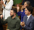 Volodymyr Zelensky, Justin Trudeau, and Chrystia Freeland applaud Yaroslav Hunka of the Waffen SS Galicia Division during a session of the Canadian Parliament September 24 2023.PNG