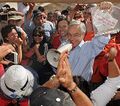 Piñera in the San José Mine with the message confirming the miners are alive.jpg
